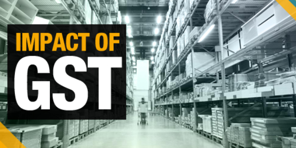 Huge distribution warehouse with high shelves and loaders with the text that showing the impact of GST on forefront.